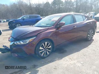 2022 Nissan Sentra SV z VIN 3N1AB8CV5NY221159, wystawiony jako IAAI lot #41322470 z przebiegiem 27 098 mil mil oraz . Historia ofert i sprzedaży dostępna na DreamBid. Obrazek 19.