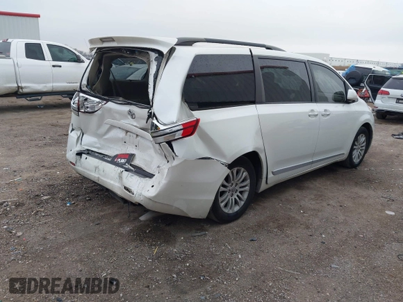 2016 Toyota Sienna XLE with VIN 5TDYK3DC2GS726677, listed as a IAAI auction lot 41609165 with 144,858 mi miles. Bid and sale history available at carsss.com. Image 4.
