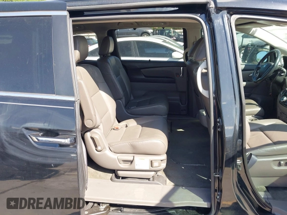 2016 Honda Odyssey EX-L with VIN 5FNRL5H61GB089853, listed as a IAAI auction lot 42019081 with 81,317 mi miles and . Bid and sale history available at DreamBid. Image 8.
