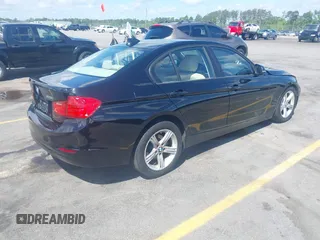 2013 BMW 3 Series 328i xDrive with VIN WBA3B5C58DF138736, listed as a IAAI auction lot 41981208 with 113,510 mi miles. Bid and sale history available at carsss.com. Image 4.