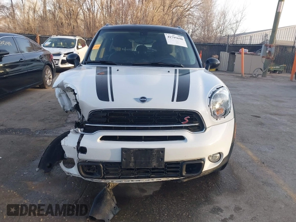 2015 MINI Cooper Countryman S with VIN WMWZC5C50FWP42324, listed as a IAAI auction lot 41795698 with 95,746 mi miles. Bid and sale history available at carsss.com. Image 12.