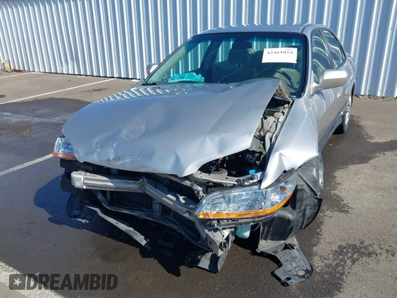 1999 Honda Accord LX with VIN JHMCG5545XC028563, listed as a IAAI auction lot 42461054 with 212,100 mi miles and . Bid and sale history available at DreamBid. Image 6.