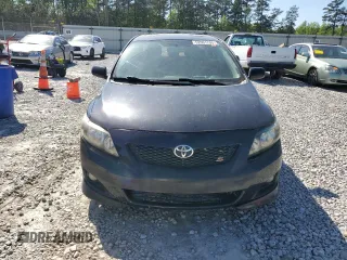 2009 Toyota Corolla with VIN 2T1BU40E19C098930, listed as a Copart auction lot 52001705 with 203,305 mi miles and Salvage Title. Bid and sale history available at carsss.com. Image 5.