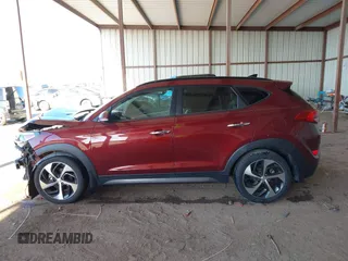 2016 Hyundai Tucson Limited with VIN KM8J33A21GU069937, listed as a IAAI auction lot 41861070 with 126,716 mi miles. Bid and sale history available at carsss.com. Image 14.