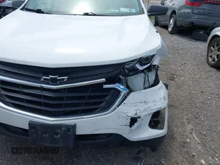 2020 Chevrolet Equinox LS z VIN 3GNAXHEV5LS515051, wystawiony jako IAAI lot #42306780 z przebiegiem 144 598 mil mil oraz . Historia ofert i sprzedaży dostępna na DreamBid. Obrazek 6.