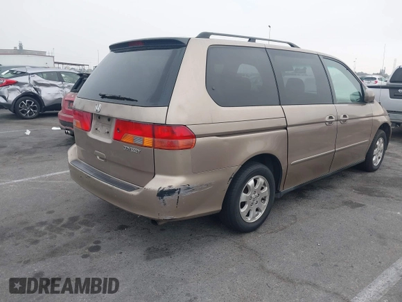 2003 Honda Odyssey EX with VIN 5FNRL186X3B074397, listed as a IAAI auction lot 41164455 with 275,188 mi miles and . Bid and sale history available at DreamBid. Image 4.