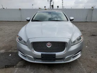 2014 Jaguar XJ Portfolio with VIN SAJWJ2GD2E8V62696, listed as a Copart auction lot 76620494 with 85,487 mi miles and Salvage title. Bid and sale history available at DreamBid. Image 5.