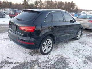 2017 Audi Q3 Premium Plus with VIN WA1HCCFS2HR017095, listed as a IAAI auction lot 41414567 with 102,475 mi miles and . Bid and sale history available at DreamBid. Image 4.