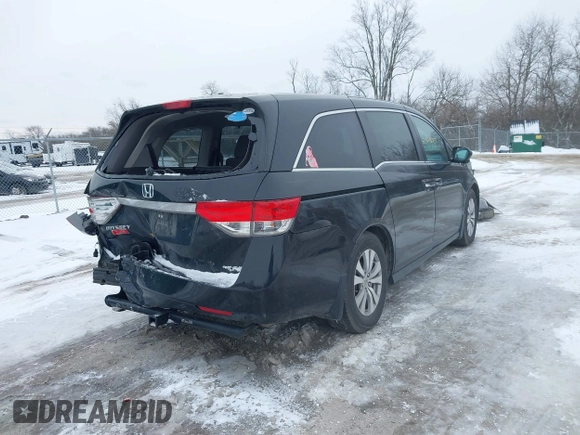 2015 Honda Odyssey EX-L with VIN 5FNRL5H60FB018030, listed as a IAAI auction lot 41608357 with 166,214 mi miles and . Bid and sale history available at carsss.com. Image 4.
