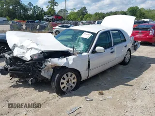 2003 Mercury Grand Marquis LS Premium with VIN 2MEFM75W53X699635, listed as a IAAI auction lot 42002694 with 154,781 mi miles and . Bid and sale history available at DreamBid. Image 2.