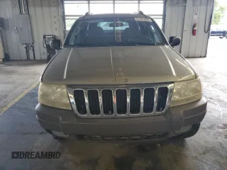 2003 Jeep Grand Cherokee Laredo with VIN 1J4GW48S43C567559, listed as a Copart auction lot 61431595 with 249,998 mi miles and Salvage title. Bid and sale history available at DreamBid. Image 5.