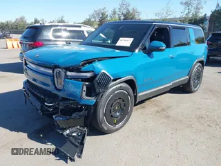 2025 Rivian R1S Adventure with VIN 7PDSGBBA9SN056202, listed as a IAAI auction lot 40766927 with 1,688 mi miles. Bid and sale history available at carsss.com. Image 6.