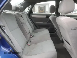 2006 Suzuki Forenza z VIN KL5JD56ZX6K372427, wystawiony jako Copart lot #80627544 z przebiegiem 94 493 mil mil oraz Tytuł czysty. Historia ofert i sprzedaży dostępna na DreamBid. Obrazek 10.