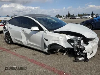 2023 Tesla Model 3 with VIN 5YJ3E1EA5PF486726, listed as a Copart auction lot 51659655 with 14,632 mi miles and Salvage title. Bid and sale history available at DreamBid. Image 4.