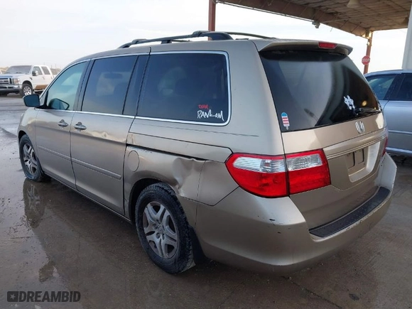 2005 Honda Odyssey EX-L with VIN 5FNRL38735B015831, listed as a IAAI auction lot 41730710 with 295,586 mi miles. Bid and sale history available at carsss.com. Image 3.