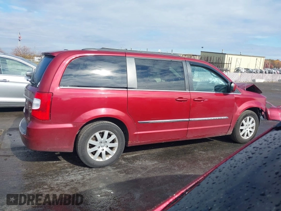 2013 Chrysler Town & Country Touring with VIN 2C4RC1BG0DR634631, listed as a IAAI auction lot 40686174 with 143,206 mi miles. Bid and sale history available at carsss.com. Image 14.
