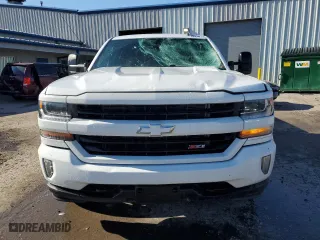 2016 Chevrolet Silverado 1500 LT with VIN 3GCUKREC8GG330137, listed as a Copart auction lot 53310775 with 111,624 mi miles and Salvage Title. Bid and sale history available at carsss.com. Image 5.