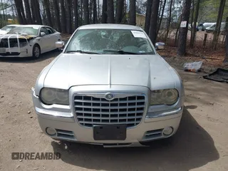 2007 Chrysler 300 C with VIN 2C3KA63H17H896796, listed as a IAAI auction lot 41929716 with 166,803 mi miles. Bid and sale history available at carsss.com. Image 12.