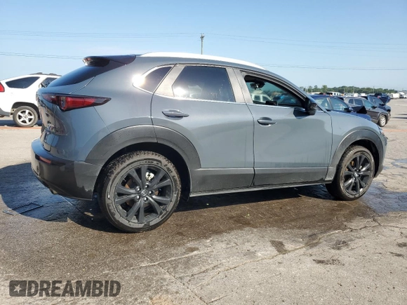 2023 Mazda CX-30 S Carbon Edition with VIN 3MVDMBCM1PM553374, listed as a Copart auction lot 62080975 with 51,527 mi miles and Salvage title. Bid and sale history available at DreamBid. Image 3.