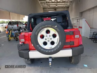 2014 Jeep Wrangler Unlimited Sahara z VIN 1C4BJWEGXEL179054, wystawiony jako IAAI lot #42151597 z przebiegiem 151 810 mil mil oraz . Historia ofert i sprzedaży dostępna na DreamBid. Obrazek 17.