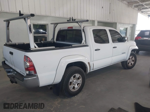 2009 Toyota Tacoma PreRunner with VIN 3TMJU62N49M090994, listed as a IAAI auction lot 41787065 with 207,386 mi miles. Bid and sale history available at carsss.com. Image 4.