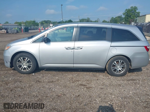 2012 Honda Odyssey EX-L with VIN 5FNRL5H65CB039015, listed as a IAAI auction lot 42612886 with 216,955 mi miles and . Bid and sale history available at DreamBid. Image 14.
