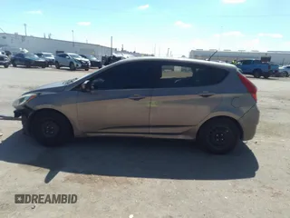 2014 Hyundai Accent GS with VIN KMHCT5AE6EU157393, listed as a IAAI auction lot 42188160 with 221,375 mi miles and . Bid and sale history available at DreamBid. Image 15.