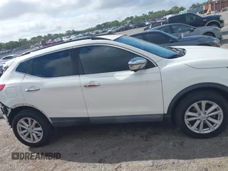 2017 Nissan Rogue SV z VIN JN1BJ1CP7HW007270, wystawiony jako IAAI lot #41908931 z przebiegiem 94 373 mil mil oraz . Historia ofert i sprzedaży dostępna na DreamBid. Obrazek 14.