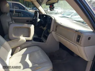 2004 GMC Yukon SLT with VIN 1GKEC13Z44J328264, listed as a IAAI auction lot 41993825 with 267,247 mi miles. Bid and sale history available at carsss.com. Image 5.