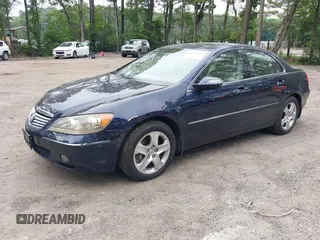 2006 Acura RL z VIN JH4KB16566C007214, wystawiony jako IAAI lot #42510457 z przebiegiem 160 005 mil mil oraz . Historia ofert i sprzedaży dostępna na DreamBid. Obrazek 2.