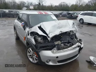 2013 MINI Cooper Countryman with VIN WMWZB3C5XDWR35844, listed as a IAAI auction lot 41203877 with 118,000 mi miles. Bid and sale history available at carsss.com. Image 1.