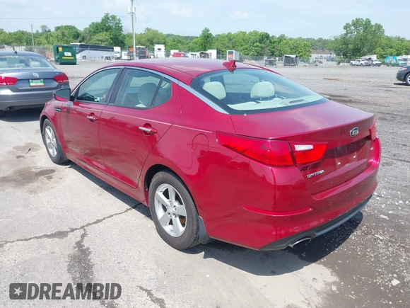 2015 Kia Optima LX z VIN 5XXGM4A72FG407864, wystawiony jako IAAI lot #42295392 z przebiegiem 177 485 mil mil oraz . Historia ofert i sprzedaży dostępna na DreamBid. Obrazek 3.