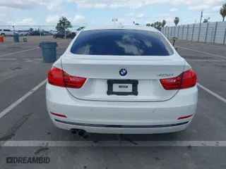 2016 BMW 4 Series 428i with VIN WBA4A9C51GGL88011, listed as a IAAI auction lot 41852057 with 117,669 mi miles. Bid and sale history available at carsss.com. Image 16.