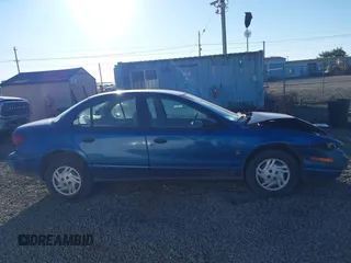 2002 Saturn SL z VIN 1G8ZF52802Z134506, wystawiony jako IAAI lot #41461865 z przebiegiem 210 886 mil mil oraz . Historia ofert i sprzedaży dostępna na DreamBid. Obrazek 13.