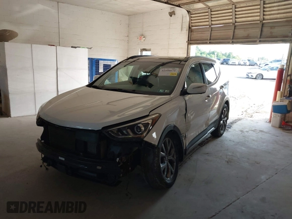 2017 Hyundai Santa Fe Ultimate with VIN 5XYZWDLA2HG491338, listed as a IAAI auction lot 42590671 with 114,521 mi miles and . Bid and sale history available at DreamBid. Image 6.