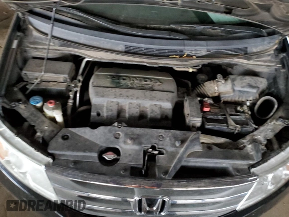 2012 Honda Odyssey Touring with VIN 5FNRL5H94CB026539, listed as a Copart auction lot 48925605 with 88,381 mi miles and Salvage Title. Bid and sale history available at DreamBid. Image 12.