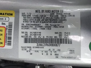 2013 Lincoln MKZ with VIN 3LN6L2J96DR800877, listed as a IAAI auction lot 41256557 with 125,584 mi miles. Bid and sale history available at carsss.com. Image 9.