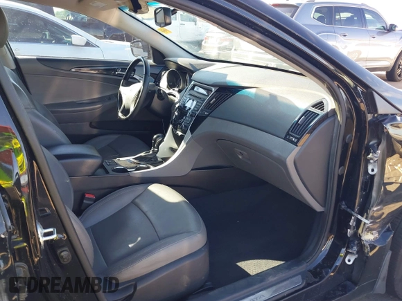 2012 Hyundai Sonata SE z VIN 5NPEC4AC6CH423122, wystawiony jako IAAI lot #41879178 z przebiegiem 64 681 mil mil oraz . Historia ofert i sprzedaży dostępna na DreamBid. Obrazek 5.