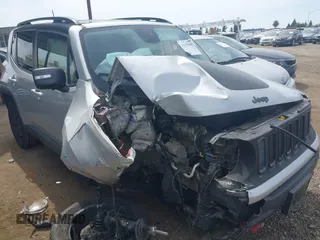 2018 Jeep Renegade Trailhawk z VIN ZACCJBCB1JPG71823, wystawiony jako IAAI lot #42159065 z przebiegiem 152 589 mil mil oraz . Historia ofert i sprzedaży dostępna na DreamBid. Obrazek 1.