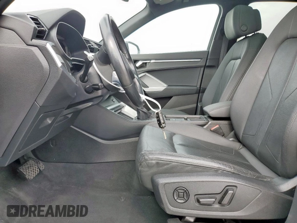 2021 Audi Q3 Premium z VIN WA1AUCF33M1058867, wystawiony jako Copart lot #56708705 z przebiegiem 55 658 mil mil oraz Szkoda całkowita • Salvage title. Historia ofert i sprzedaży dostępna na DreamBid. Obrazek 7.
