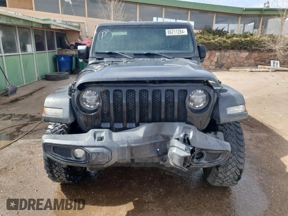 2021 Jeep Wrangler Sport S with VIN 1C4HJXAG0MW757004, listed as a Copart auction lot 86211284 with 51,050 mi miles and Salvage Title. Bid and sale history available at DreamBid. Image 5.