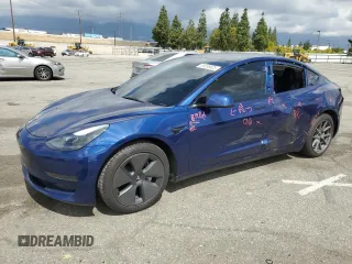 2023 Tesla Model 3 z VIN 5YJ3E1EA4PF496888, wystawiony jako Copart lot #51036605 z przebiegiem 74 678 mil mil oraz Szkoda całkowita • Salvage title. Historia ofert i sprzedaży dostępna na DreamBid. Obrazek 1.
