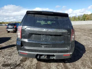 2021 Chevrolet Tahoe Commercial with VIN 1GNSKLED4MR476230, listed as a Copart auction lot 75313974 with 124,085 mi miles and Salvage Title. Bid and sale history available at carsss.com. Image 6.