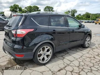 2018 Ford Escape Titanium with VIN 1FMCU0J92JUC84901, listed as a Copart auction lot 60428635 with 69,210 mi miles and Salvage title. Bid and sale history available at DreamBid. Image 3.