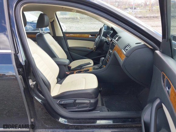 2015 Volkswagen Passat 1.8T Sport with VIN 1VWBT7A35FC062984, listed as a IAAI auction lot 42053939 with 106,095 mi miles. Bid and sale history available at carsss.com. Image 5.