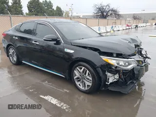 2020 Kia Optima Hybrid EX with VIN KNAGU4LE2L5039095, listed as a IAAI auction lot 41746011 with 82,014 mi miles. Bid and sale history available at carsss.com. Image 1.