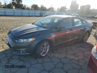2015 Ford Fusion SE Hybrid with VIN 3FA6P0LU4FR213570, listed as a Copart auction lot 82136224 with 148,524 mi miles and Salvage Title. Bid and sale history available at carsss.com. Image 1.