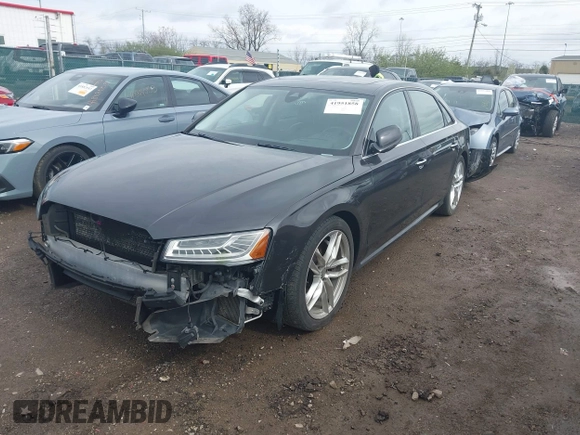 2016 Audi A8 L 4.0T Sport with VIN WAU43AFD3GN020763, listed as a IAAI auction lot 41951858 with 104,563 mi miles. Bid and sale history available at carsss.com. Image 19.