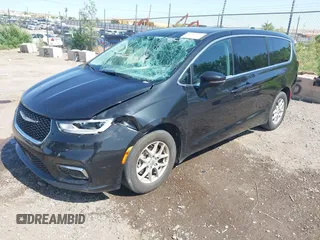 2023 Chrysler Pacifica Touring L with VIN 2C4RC1BG9PR628170, listed as a IAAI auction lot 42515590 with 41,987 mi miles and . Bid and sale history available at DreamBid. Image 17.