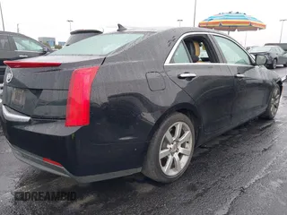 2013 Cadillac ATS z VIN 1G6AA5RA6D0122459, wystawiony jako IAAI lot #41549859 z przebiegiem 144 641 mil mil oraz . Historia ofert i sprzedaży dostępna na DreamBid. Obrazek 4.
